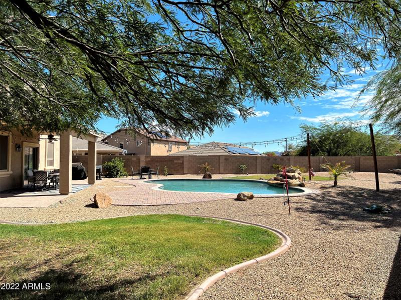 Pool side yard to patio view