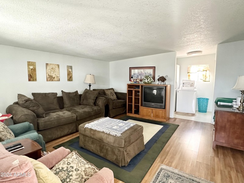 BACK ROOM OPENING TO LAUNDRY/BATHROOM