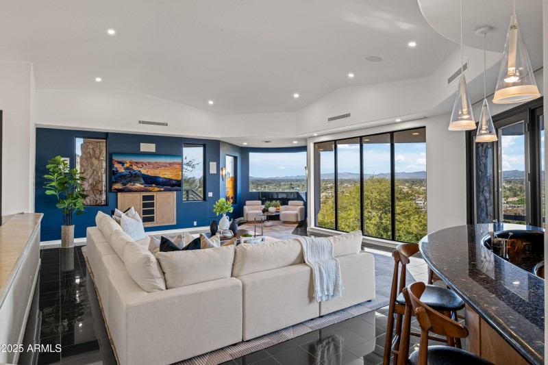 Entertain from the bar to fireplace