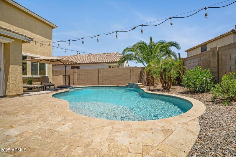 Travertine tile pool deck