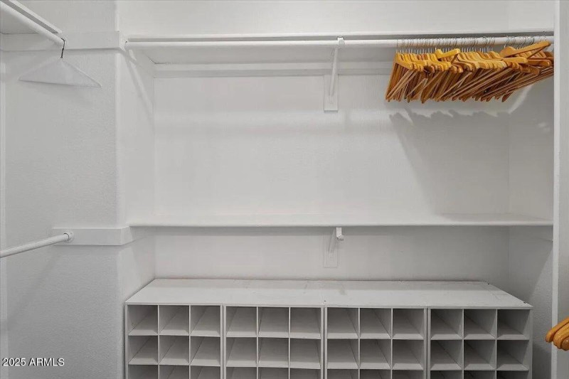 Walk in closet with shoe storage