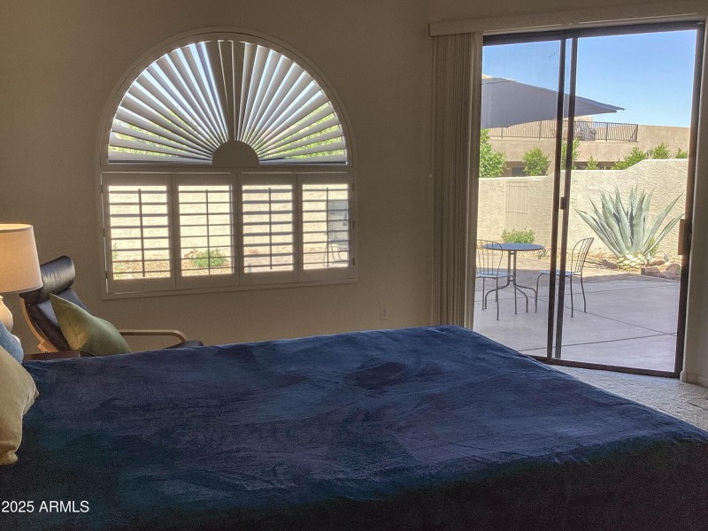 DOWNSTAIRS MASTER OPENS TO PATIO