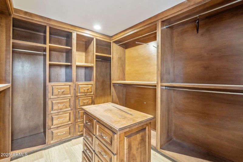 Closet in primary bedroom