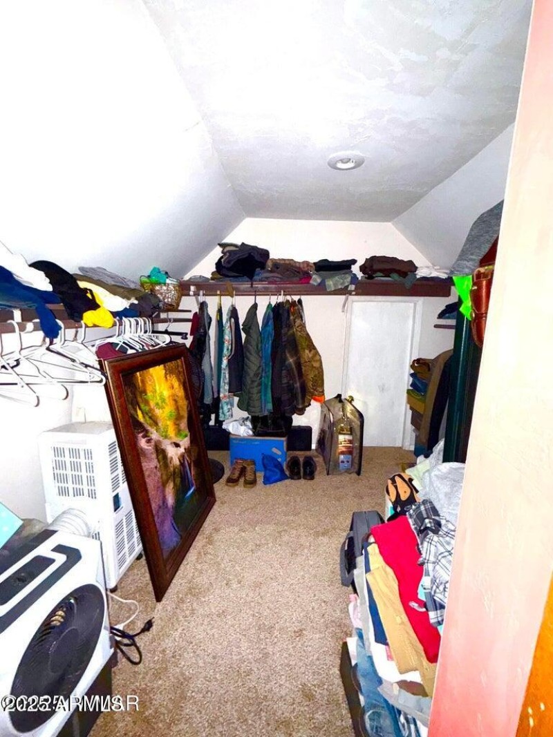 upstairs primary closet w/ attic access