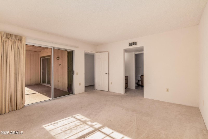 Primary Bedroom w/ Sliding Door