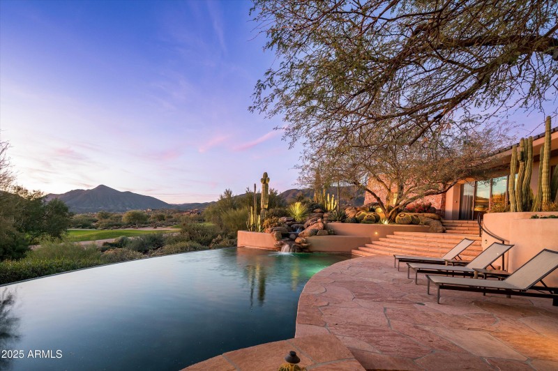 Sunsets over golf course and mountains