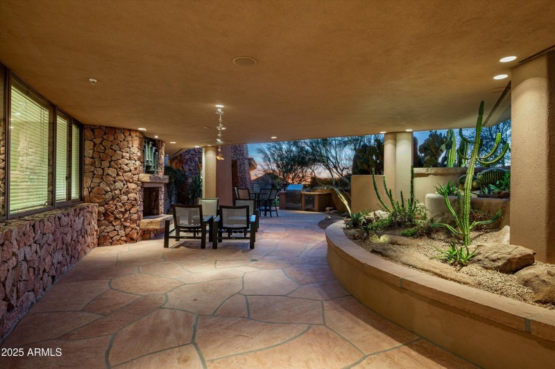 Cozy covered patio with fireplace