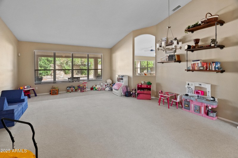 large window overlooking backyard