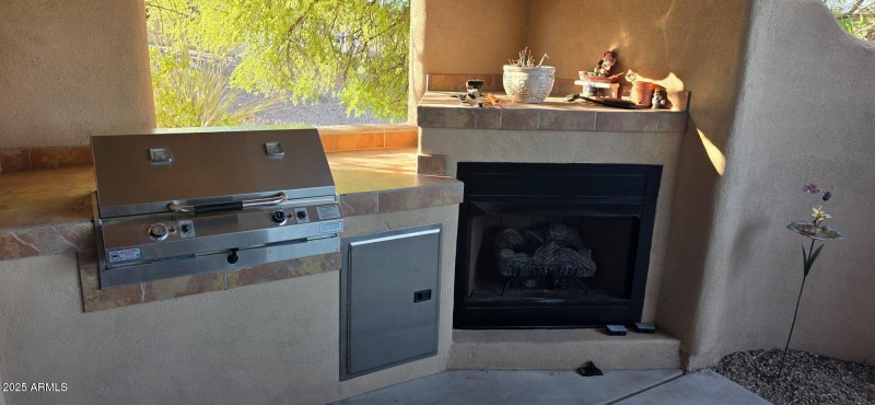 outdoor BBQ and fireplace close up