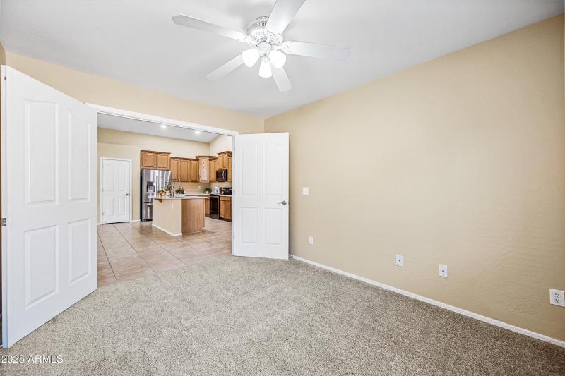 DEN/OFFICE OPEN TO KITCHEN