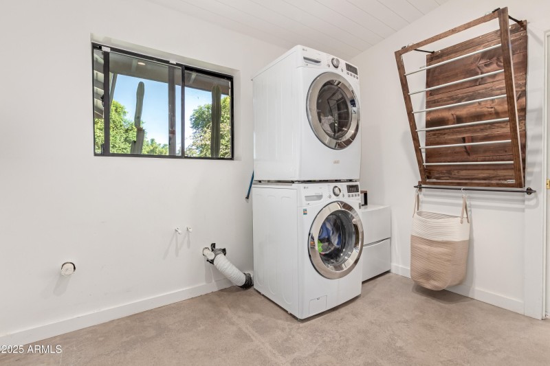 Laundry room with built in sitting area