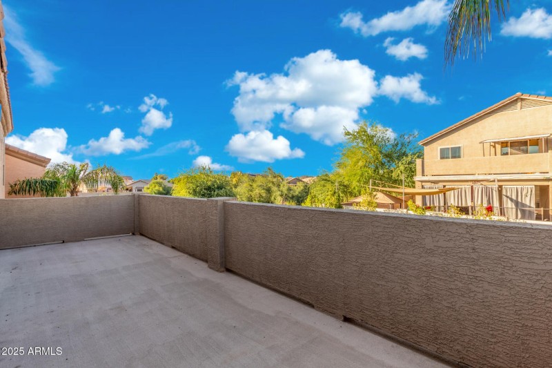 Patio off den overlooking backyard