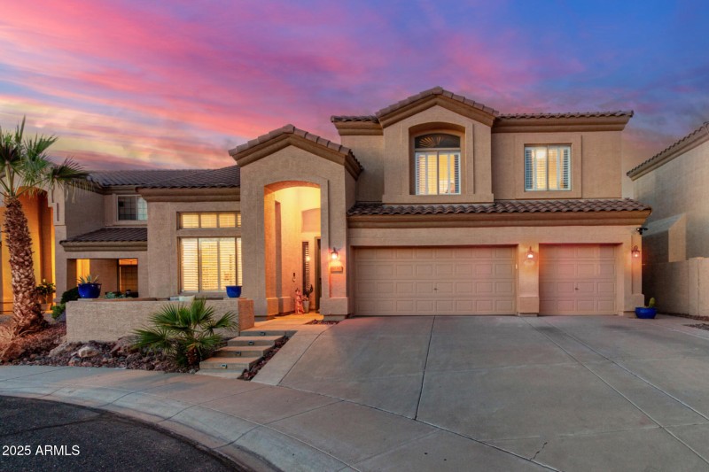 Front of home at sunset