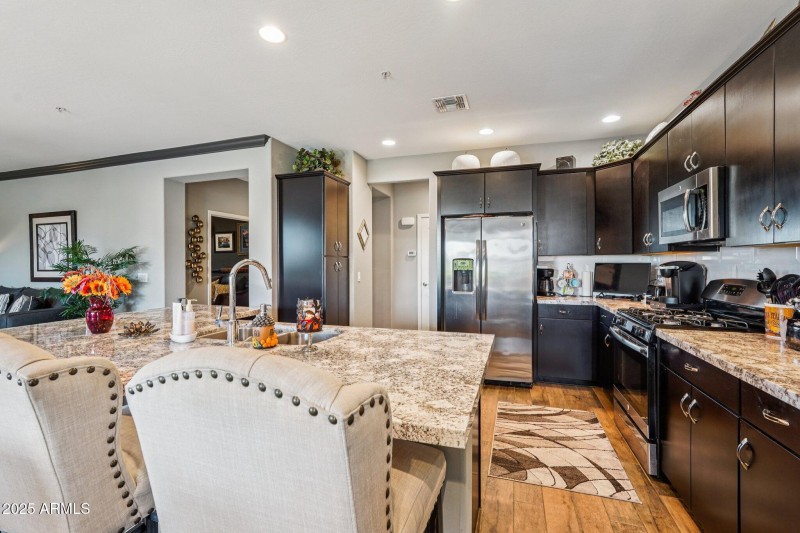 Espresso Cabinets and Gorgeous Granite