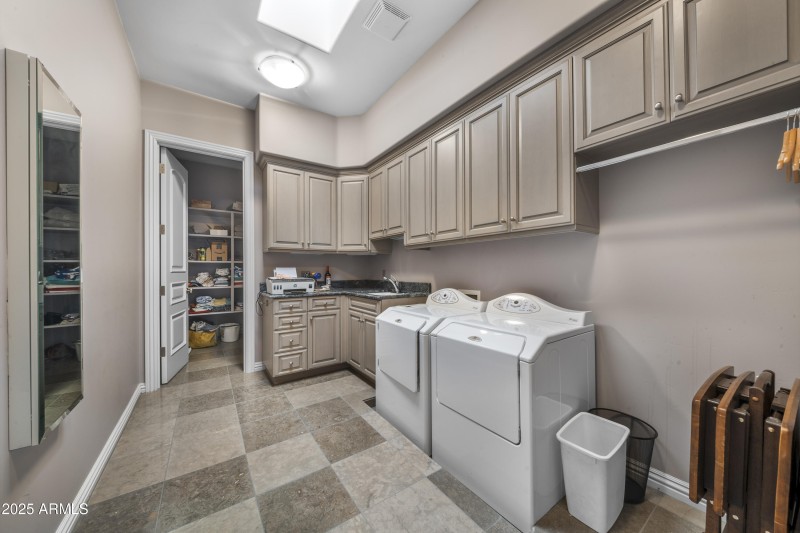 Large Laundry room with ample storage