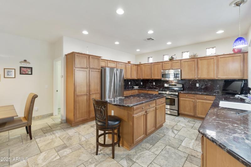 Kitchen with eating area and island