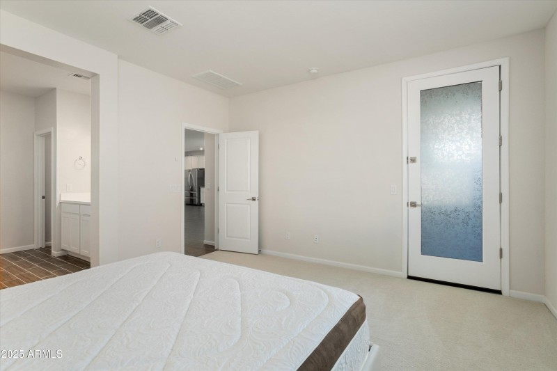 Primary Bedroom with Exit Door