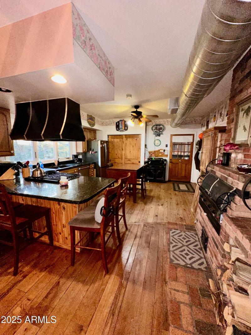 DOOR GOES TO OVER SIZED 2CAR GARAGE