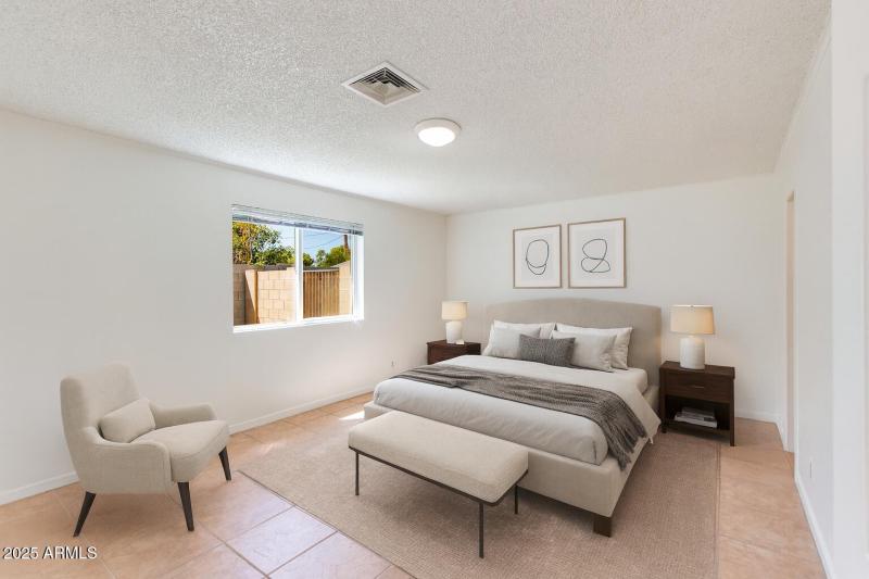 primary bedroom/ staged