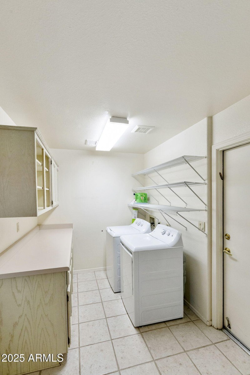 Laundry with cabinets