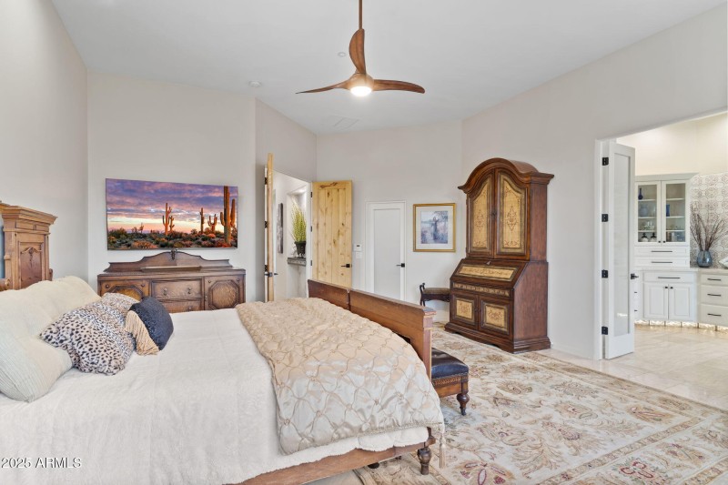 Primary bedroom w/French doors to bath