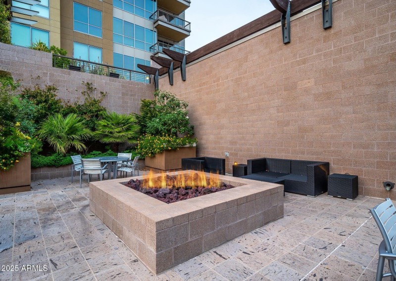 ONE OF TWO FIREPIT AREAS