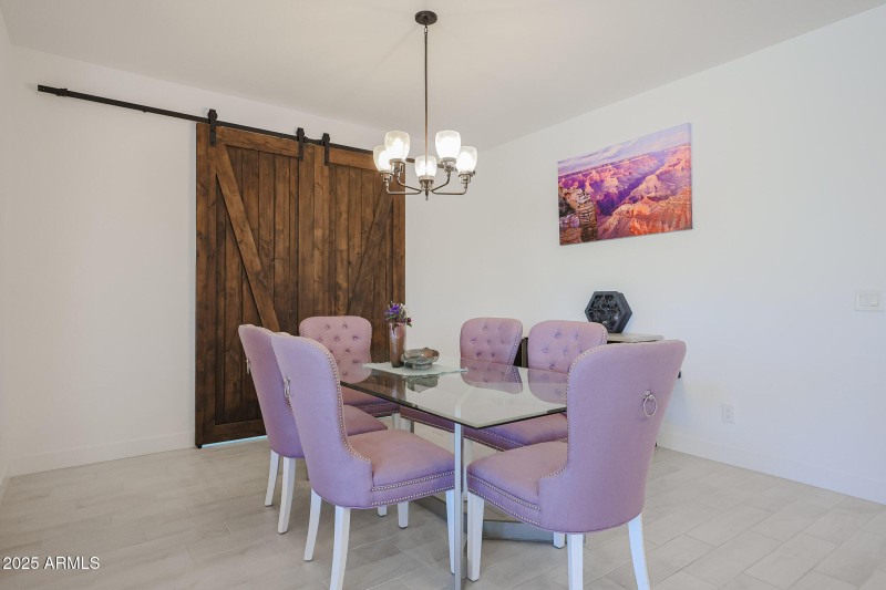 Dining Area w/ Barn Doors to Office