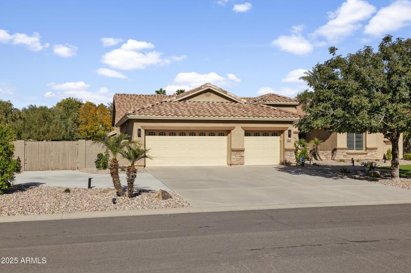 3 CAR GARAGE AND EXTRA PARKING