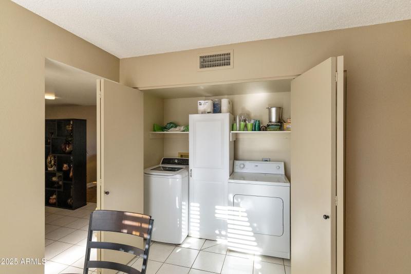 Laundry closet off kitchen