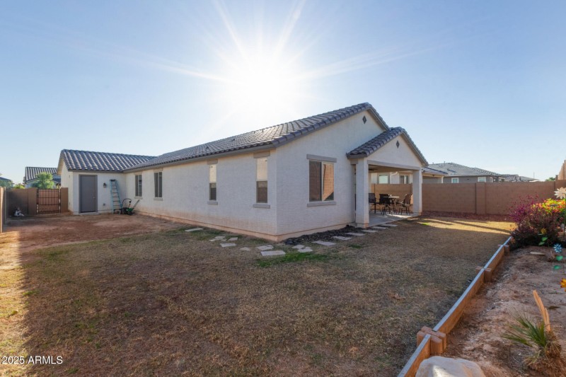 Large Backyard with Patio Space