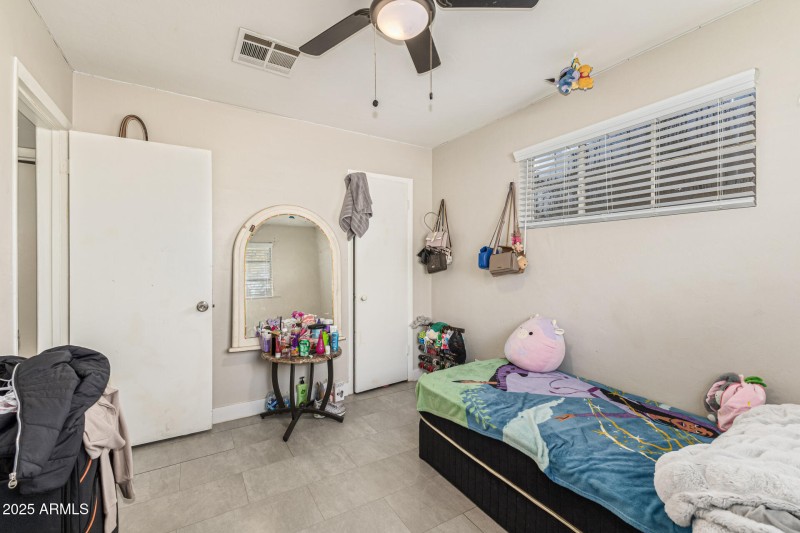 Bedroom with Dual Windows