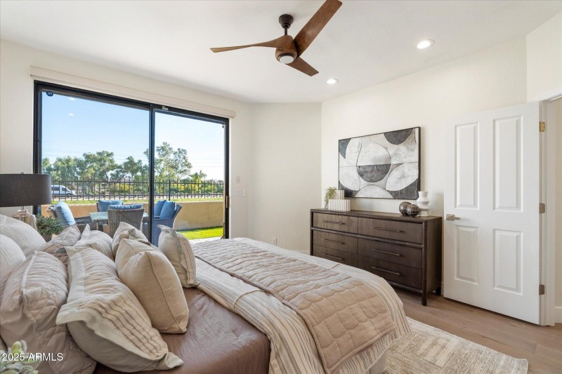 Primary Suite with sliders to patio