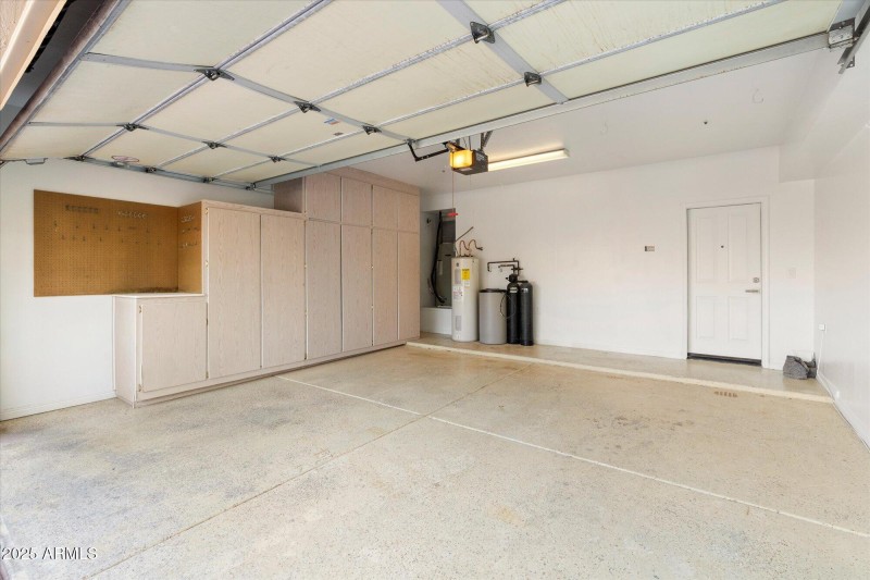 2 Car Garage with Storage Cabinets