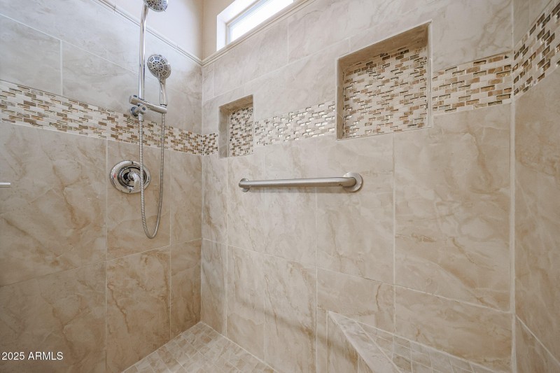 Fully Tiled Shower in Primary Bedroom