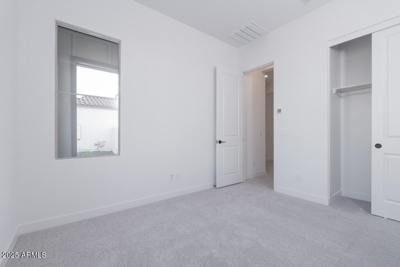 Tri Pointe Soleo 644 - Bedroom 2-1MLS