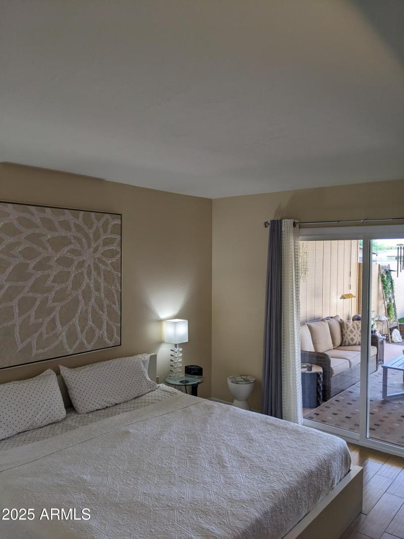 PRIMARY BDRM OVERLOOKING PRIVATE PATIO