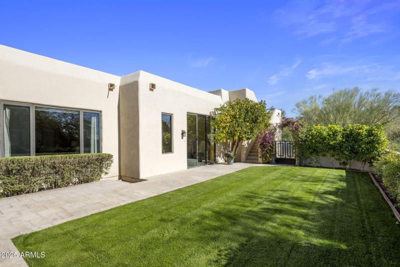 Grassy play adjacent to family rom