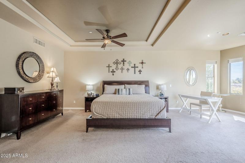 Another view of primary bedroom