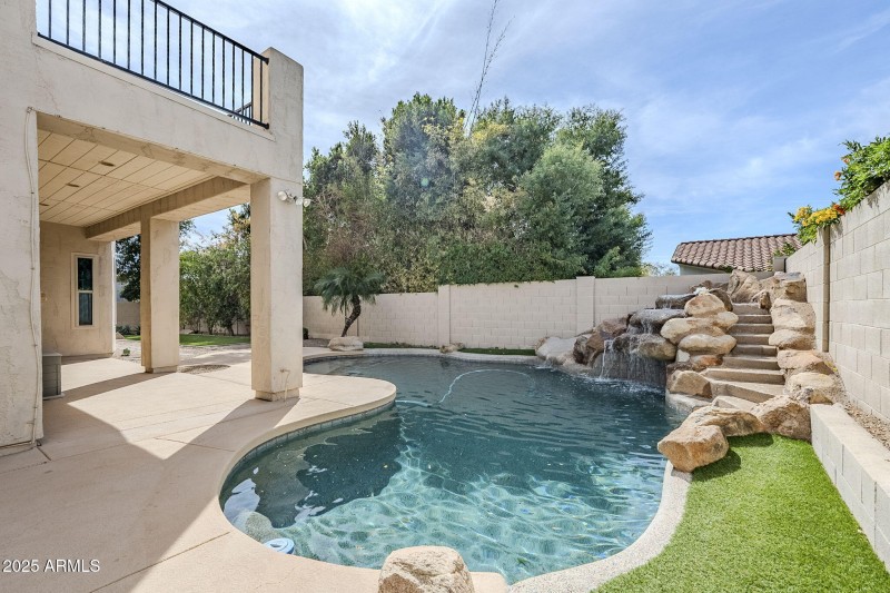 Play pool with waterfall and slide!