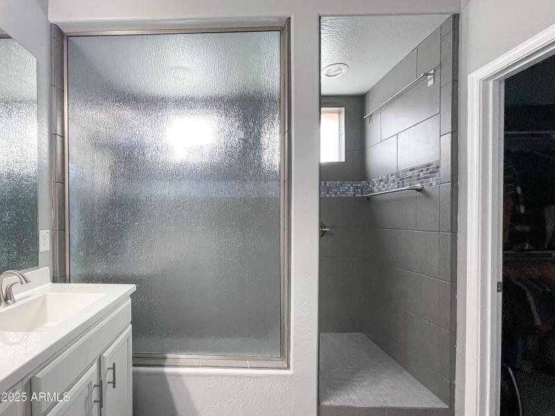 Walk In Shower and Double Sinks