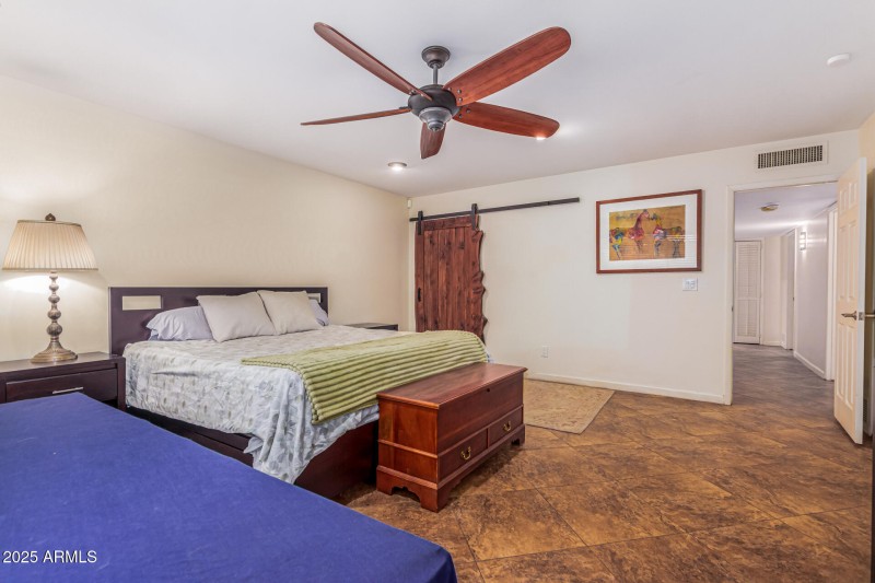Master w/2nd barn door walk-in closet.