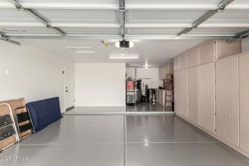 Large garage with work bench & storage