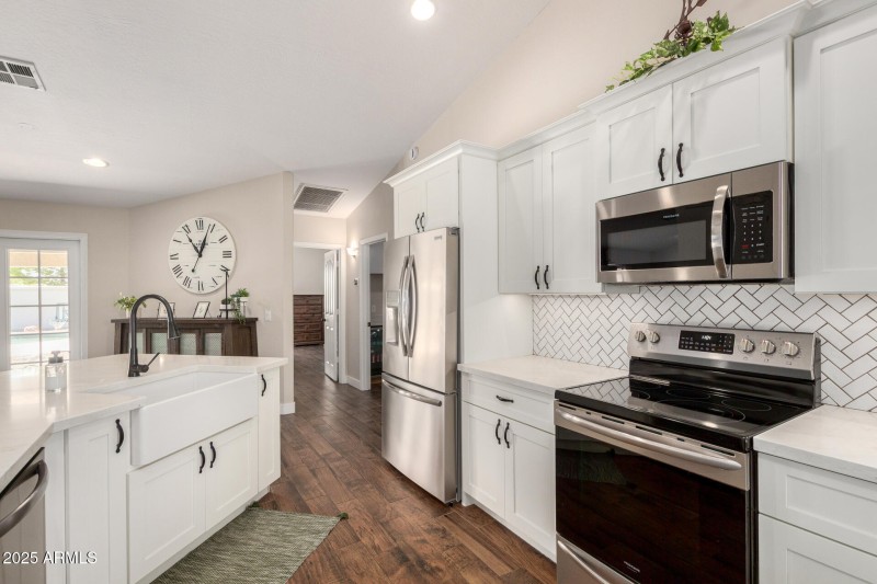 Kitchen has beautiful deep farm sink