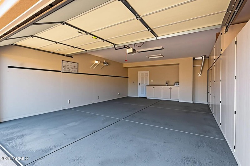Extended Garage w/Buit-in Cabinets