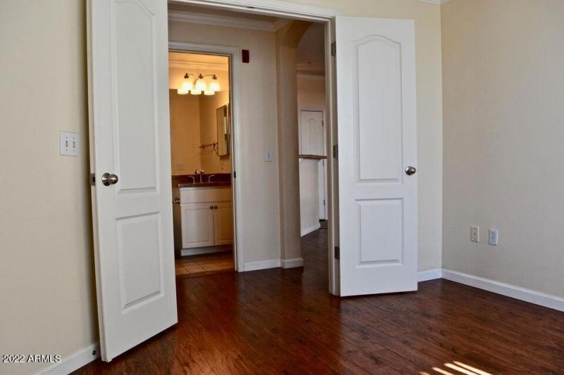 12 Front bedroom has french doors
