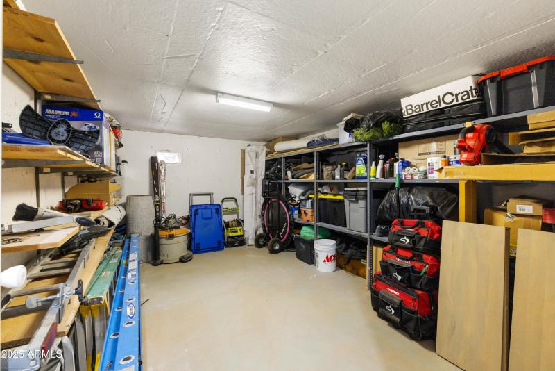storage area accessed by garage stairs