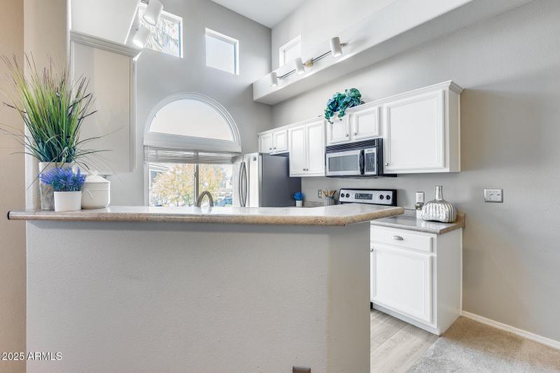 Kitchen Tall Ceilings and Large Window