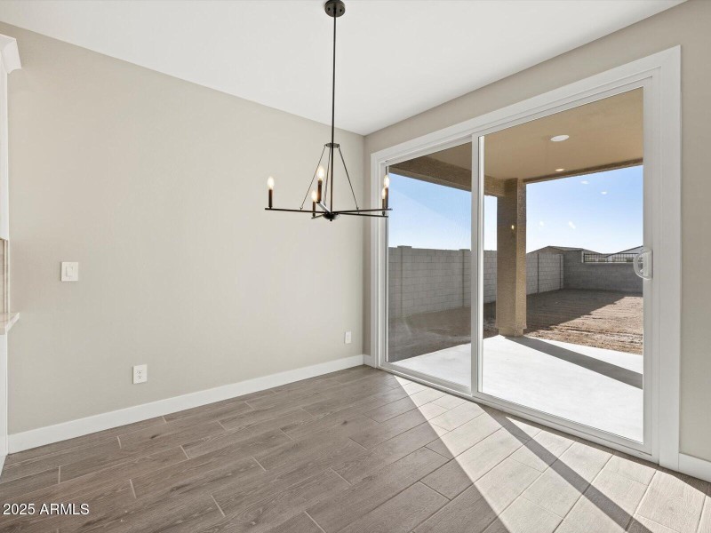 Photo is not of the actual home.