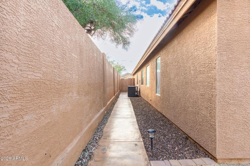 Painted concrete side yard