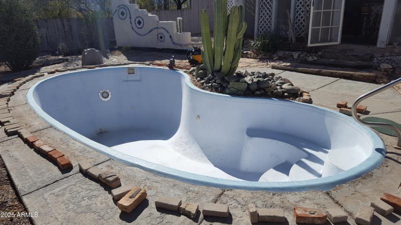 Back yard pool drained